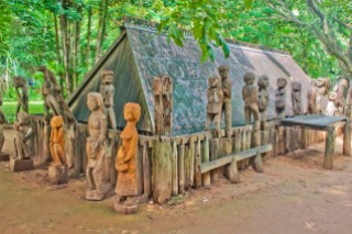 Giarai Tomb. wooden figures accompany the dead in the afterlife