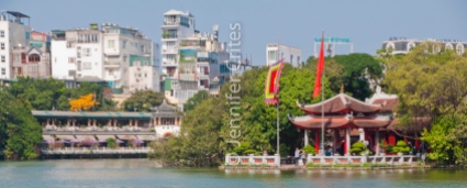 A walk around the lake reveals this temple on an island in the middle, and apartment buildings/hotels beyond