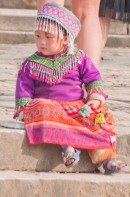 little girl in hill-tribe clothing
